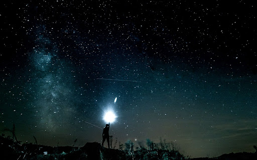 Person Under a Star Filled Night Sky  from Chrome web store to be run with OffiDocs Chromium online