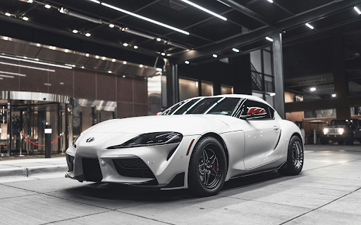 Photo Of Supra Parked In Front Of Building  from Chrome web store to be run with OffiDocs Chromium online