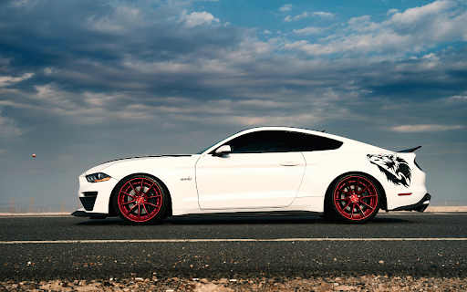 Photo of White Mustang Parked on Asphalt Road  from Chrome web store to be run with OffiDocs Chromium online