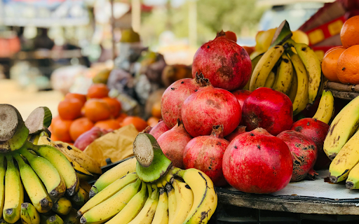 Pomegranates Beside Yellow Bananas  from Chrome web store to be run with OffiDocs Chromium online