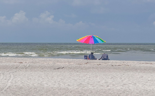 Rainbow umbrella on the beach  from Chrome web store to be run with OffiDocs Chromium online