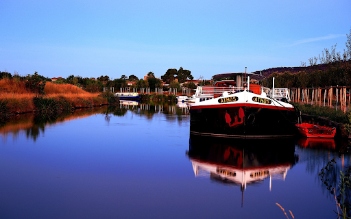 Red boat on the river  from Chrome web store to be run with OffiDocs Chromium online