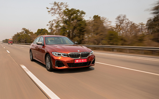 Red Car Driving on the Road  from Chrome web store to be run with OffiDocs Chromium online