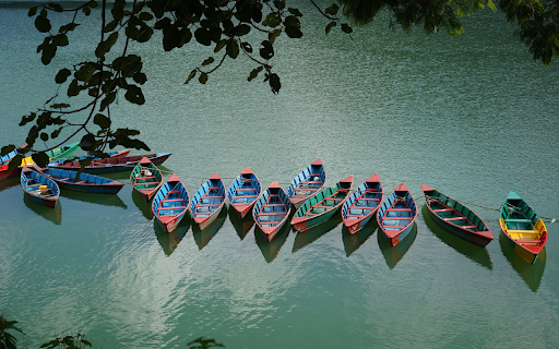 River travel with small boats  from Chrome web store to be run with OffiDocs Chromium online