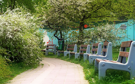 Rows of green park chairs  from Chrome web store to be run with OffiDocs Chromium online