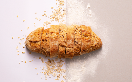 Rustic Sliced Loaf: A Study in Texture and Contrast  from Chrome web store to be run with OffiDocs Chromium online