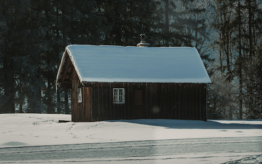 Secluded Snowy Cabin in Winter Forest  from Chrome web store to be run with OffiDocs Chromium online