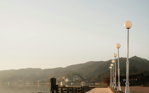 Serene Lakeside Boardwalk at Sunrise  from Chrome web store to be run with OffiDocs Chromium online