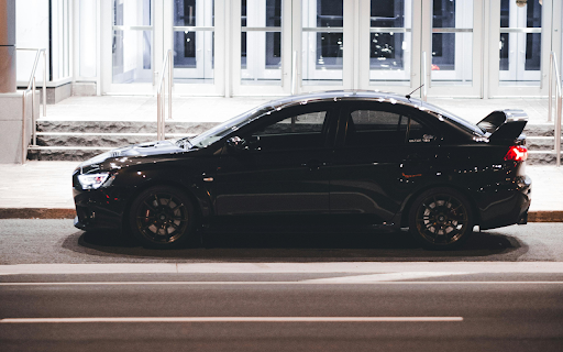 Side View of a Black Mitusbishi Lancer  from Chrome web store to be run with OffiDocs Chromium online