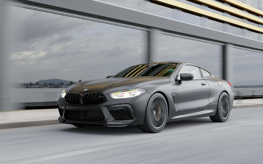 Sleek BMW Car in Motion on Modern Road  from Chrome web store to be run with OffiDocs Chromium online