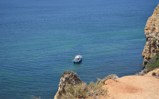 Small boat and blue ocean  from Chrome web store to be run with OffiDocs Chromium online