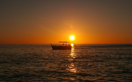 Small boat and sunset  from Chrome web store to be run with OffiDocs Chromium online