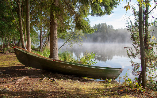Small boat on the riverbank  from Chrome web store to be run with OffiDocs Chromium online
