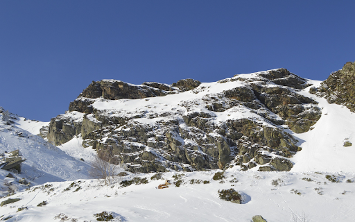 Snow covered rocky mountains  from Chrome web store to be run with OffiDocs Chromium online