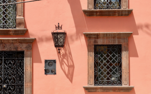 Soft Orange Wall with Windows and Lamp  from Chrome web store to be run with OffiDocs Chromium online