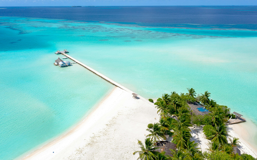 Stunning Aerial View of a Maldives Private Island  from Chrome web store to be run with OffiDocs Chromium online