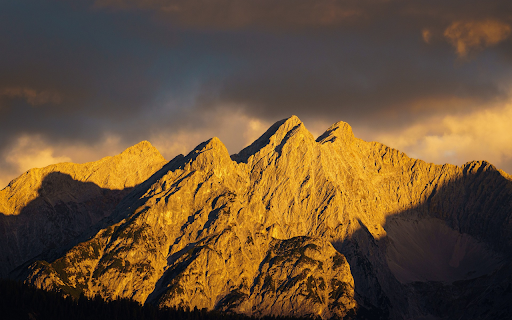 Sunlight on rocky mountains  from Chrome web store to be run with OffiDocs Chromium online
