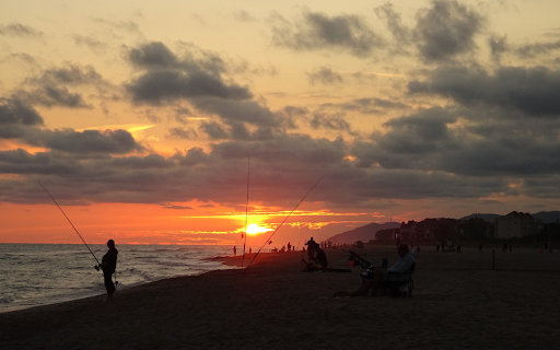 Sunset and anglers  from Chrome web store to be run with OffiDocs Chromium online