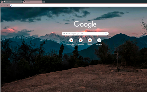 sunset over distant majestic snow capped mountains  from Chrome web store to be run with OffiDocs Chromium online