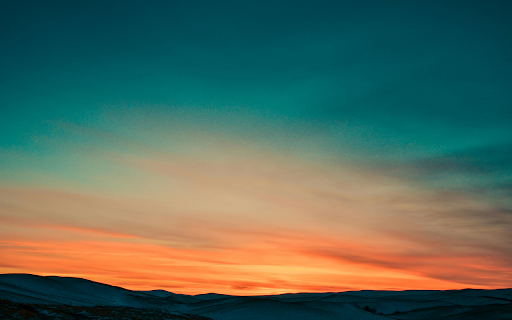 Sunset over Snow Covered Mountains  from Chrome web store to be run with OffiDocs Chromium online