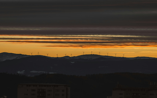 Sunset Over Windmills in Graz, Austria  from Chrome web store to be run with OffiDocs Chromium online