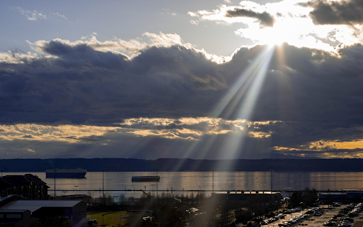 Sun shines through the clouds  from Chrome web store to be run with OffiDocs Chromium online