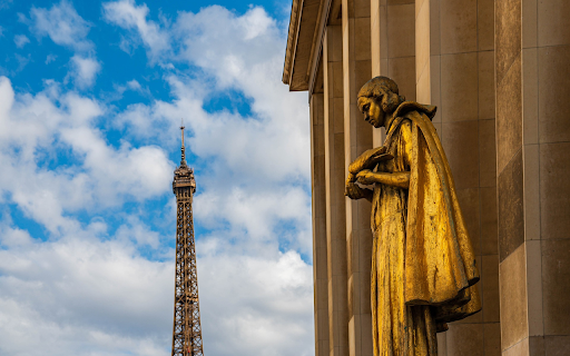 Tall tower and yellow statue  from Chrome web store to be run with OffiDocs Chromium online