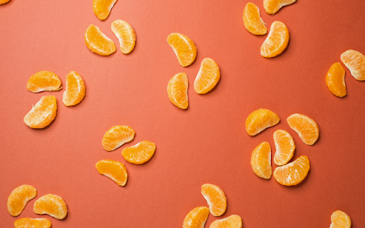 Tangerine Slices on a Red Background from Chrome web store to be run with OffiDocs Chromium online Tangerine Slices on a Red Background from Chrome web store to be run with OffiDocs Chromium online