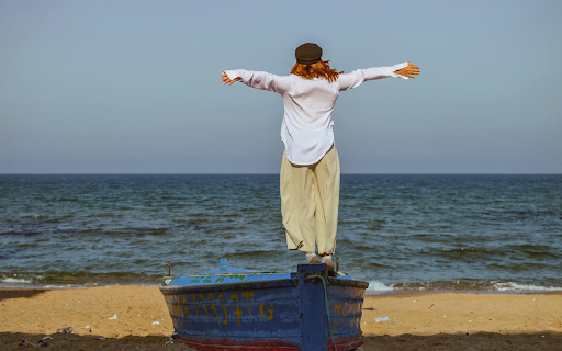The girl spread her arms  from Chrome web store to be run with OffiDocs Chromium online
