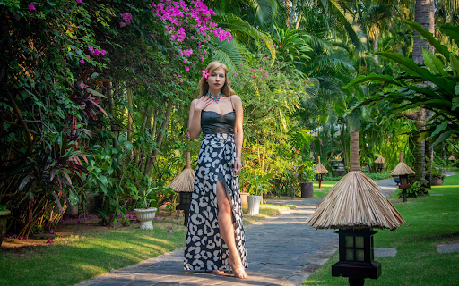 The girl stood under the bougainvillea tree  from Chrome web store to be run with OffiDocs Chromium online