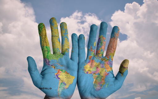 The hand that hugs the world  from Chrome web store to be run with OffiDocs Chromium online