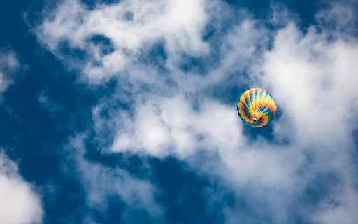The hot air balloon is flying high  from Chrome web store to be run with OffiDocs Chromium online