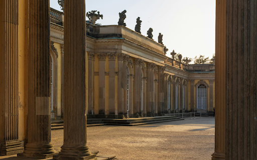 The sun shines through the columns of a building  from Chrome web store to be run with OffiDocs Chromium online