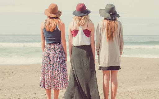 Three girls watching the sea  from Chrome web store to be run with OffiDocs Chromium online