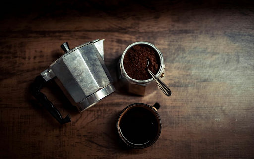 Top View of a Coffee Maker and a Cup of Coffee  from Chrome web store to be run with OffiDocs Chromium online