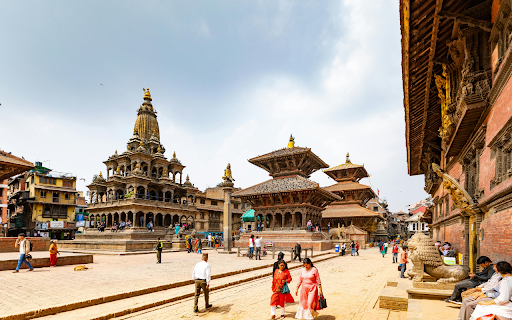 Tourists Sightseeing on Patan Durbar Square in Nepal  from Chrome web store to be run with OffiDocs Chromium online