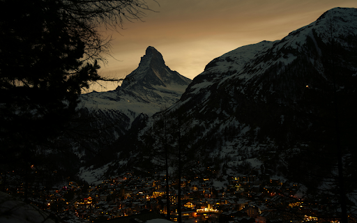 Town in a Mountain Valley at Night  from Chrome web store to be run with OffiDocs Chromium online