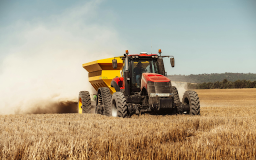 Tractor Driving through Field  from Chrome web store to be run with OffiDocs Chromium online