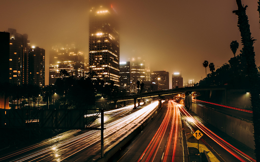 Traffic in Illuminated City at Night  from Chrome web store to be run with OffiDocs Chromium online