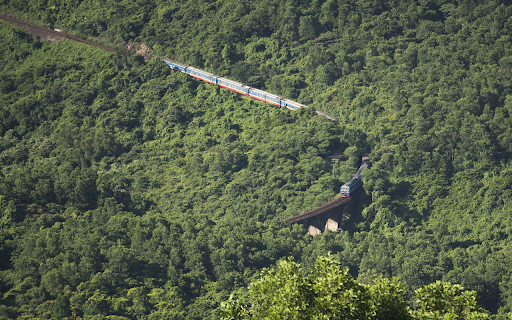 Train passes through the mountains  from Chrome web store to be run with OffiDocs Chromium online
