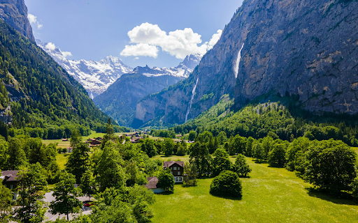 Trees around Village in Valley in Mountains  from Chrome web store to be run with OffiDocs Chromium online