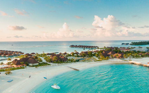 Tropical paradise: Luxury resort on turquoise water  from Chrome web store to be run with OffiDocs Chromium online