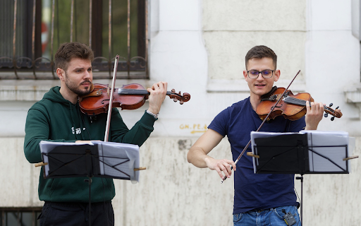 Two gentlemen and music  from Chrome web store to be run with OffiDocs Chromium online