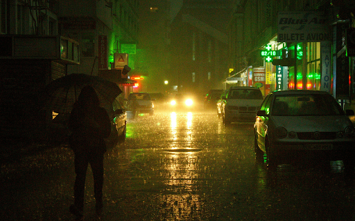 Umbrella Walking on Sidewalk during Night Time  from Chrome web store to be run with OffiDocs Chromium online