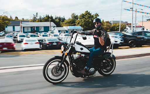 Unrecognizable biker on chopper motorcycle  from Chrome web store to be run with OffiDocs Chromium online