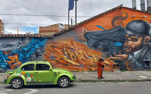 Vibrant Urban Street Art with Vintage Car  from Chrome web store to be run with OffiDocs Chromium online
