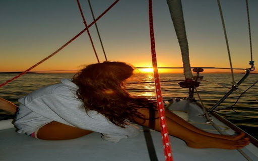 wallpaper girl and yacht at sea  from Chrome web store to be run with OffiDocs Chromium online