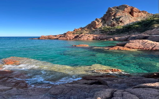 Wallpaper of rocky outcrops on the clear blue sea  from Chrome web store to be run with OffiDocs Chromium online