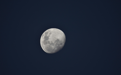Waning Gibbous in the Dark Night Sky  from Chrome web store to be run with OffiDocs Chromium online