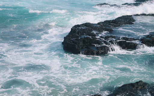 Waves crashing against rocks  from Chrome web store to be run with OffiDocs Chromium online